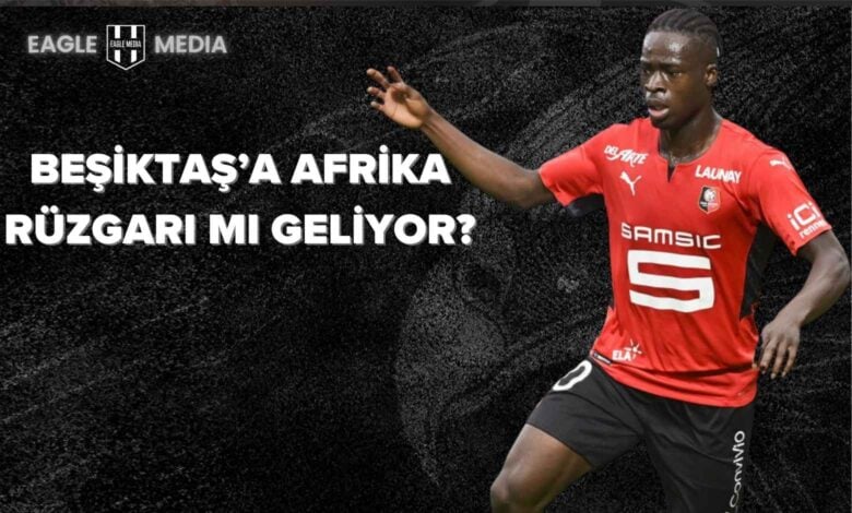 Siyah arka plan üzerinde “Beşiktaş’a Afrika Rüzgarı mı Geliyor?” yazısı ve sağ tarafta kırmızı Rennes formasıyla koşan Kamaldeen Sulemana’nın yer aldığı haber görseli. Görsel, Beşiktaş’ın transfer gündemindeki Ganalı oyuncuya dair haberi temsil ediyor.