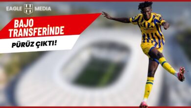 "Sarı-lacivert çizgili Dunajska Streda formasıyla şut çeken Mahmudu Bajo'nun yer aldığı, arka planda stadyum silueti bulunan ve 'Bajo Transferinde Pürüz Çıktı!' başlıklı Eagle Media tasarımı görsel."