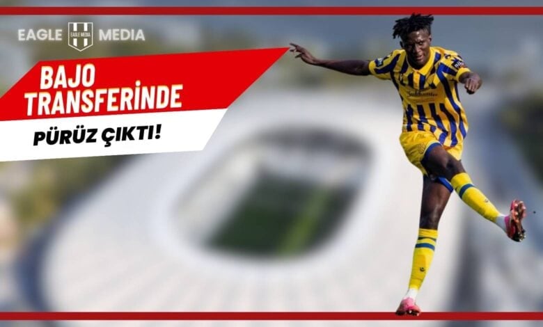 "Sarı-lacivert çizgili Dunajska Streda formasıyla şut çeken Mahmudu Bajo'nun yer aldığı, arka planda stadyum silueti bulunan ve 'Bajo Transferinde Pürüz Çıktı!' başlıklı Eagle Media tasarımı görsel."