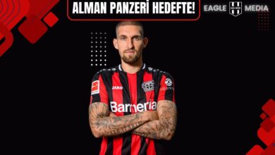 Bayer Leverkusen forması giyen Alman ön libero Robert Andrich’in kolları çapraz şekilde poz verdiği bir görsel. Arka planda “Alman Panzeri Hedefte!” başlığı ve Eagle Media logosu yer almakta.